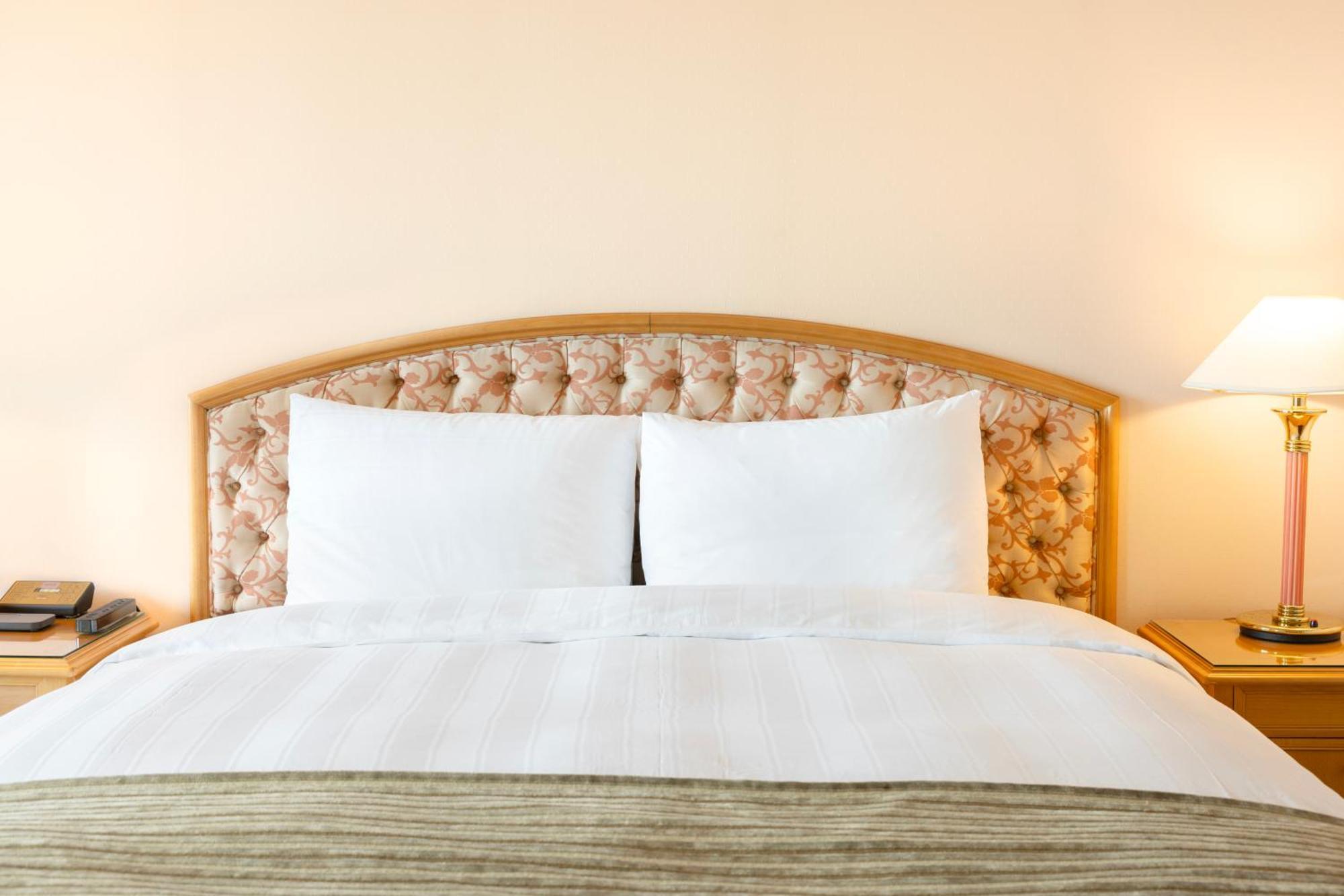Lotte Hotel Busan Eksteriør bilde A bed with a headboard